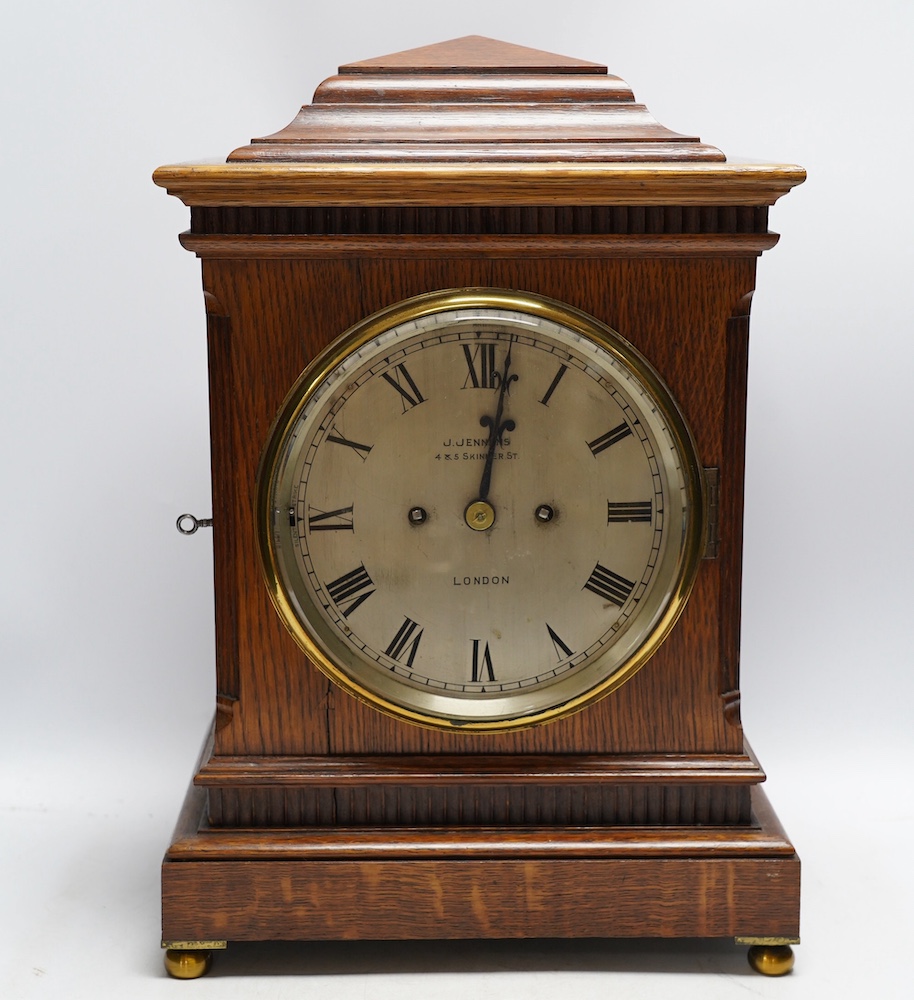 A mid 19th century oak eight day mantel clock, signed J. Jennens, Skinner St. London, pendulum, no key. 45cm. Condition - fair to good, a little faded in areas. Not tested as working